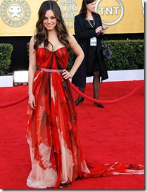 Actress Mila Kunis arrives at the 17th Annual Screen Actors Guild Awards held at The Shrine Auditorium on January 30, 2011 in Los Angeles, California.